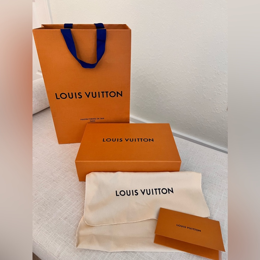 Authentic Louis Vuitton gift bag, box, and cloth cover.